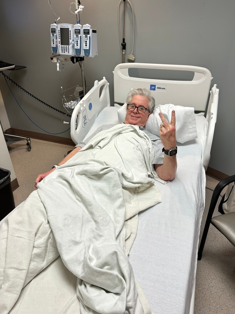 During my second MOGA infusion, holding up two fingers