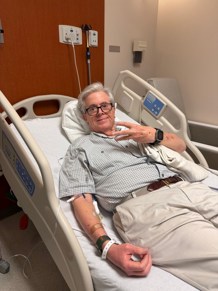 During my third MOGA infusion, resting in bed with an IV in my arm
